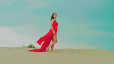 Passionate charming stylish woman posing model on backdrop sandy beach Stock Footage 155996002