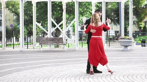 Passionate couple dancing a passionate dance on the street Stock Footage 116495095