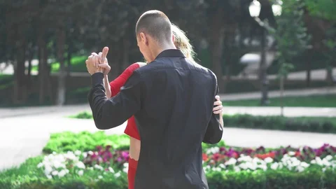 Passionate couple dancing a passionate dance on the street Stock Footage 116803692