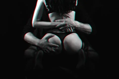 Passionate foreplay between a man and a girl Stock Photos