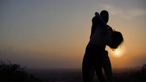 Passionate salsa professional dancers practising dance outdoors at sunset Stock Footage 133280678