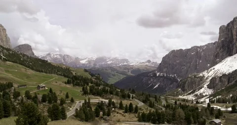 Passo Gardena looking down to Badia Valley in Alto Adige. Aerial view down pass Stock Footage 132121889