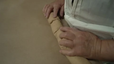 Passover Matzah baking process: Kneading dough and dividing it into equal pieces Stock Footage 335382144