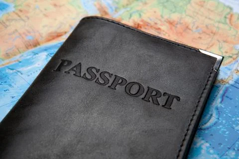 Passport in the bag on a map 库存照片