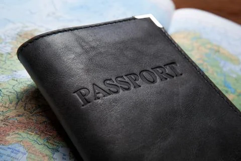 Passport in the bag on a map 库存照片