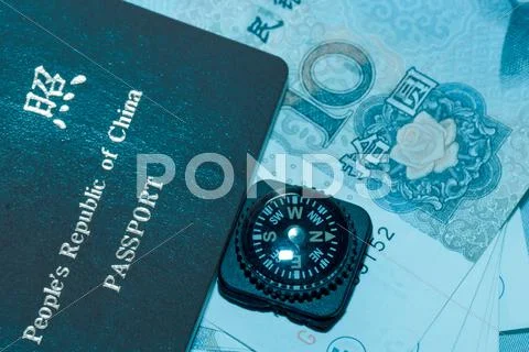 Passport bank note and compass Stock Photos