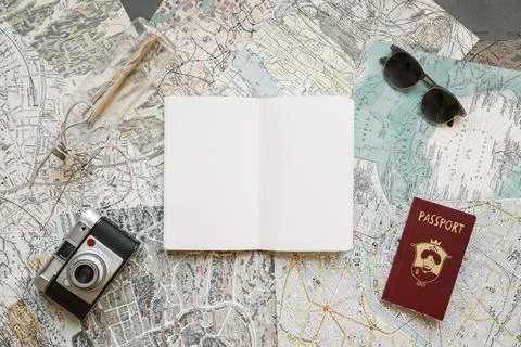 Passport with camera notepad maps Stock Photos