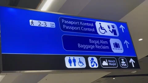 Passport control and baggage claim sign in Istanbul airport Stock Footage 337190463