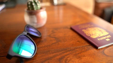 Passport Drop on Table Stock Footage 92843574