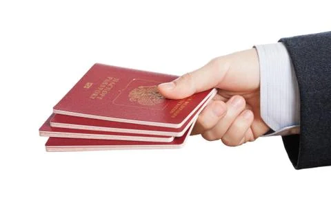 Passport id document in hand Stock Photos