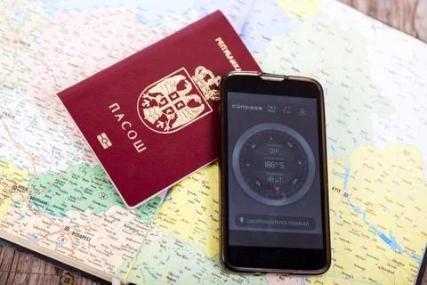 Passport on map Stock Photos