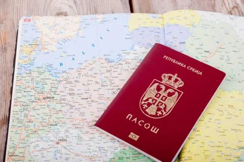 Passport on map Stock Photos
