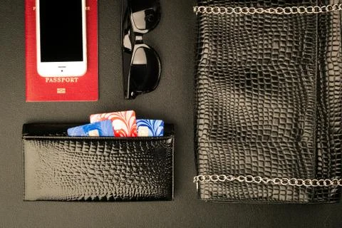 Passport with a note,black table Stock Photos