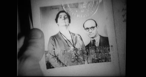 Passport officer checking passport of man Stock Footage