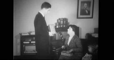 Passport officer listening to grievances of woman Stock Footage