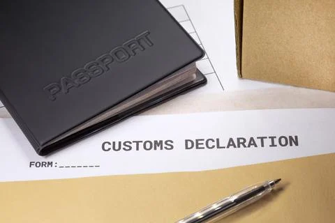 A Passport over Customs Declaration form. customs Agent concept. Planning a d Stock Photos