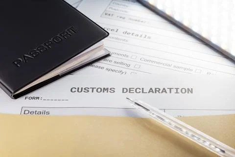 A Passport over Customs Declaration form. customs Agent concept. Planning a d Stock Photos