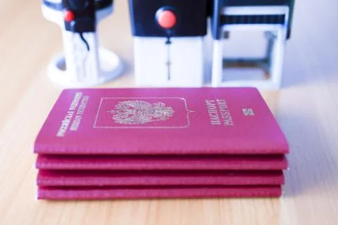 Passport on the table Stock Photos