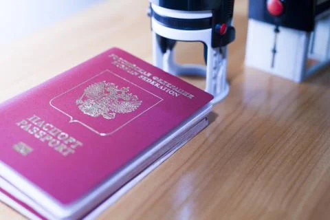 Passport on the table Stock Photos