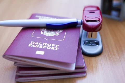 Passport on the table Stock Photos