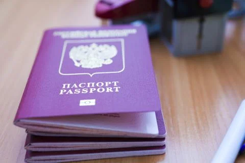 Passport on the table Stock Photos