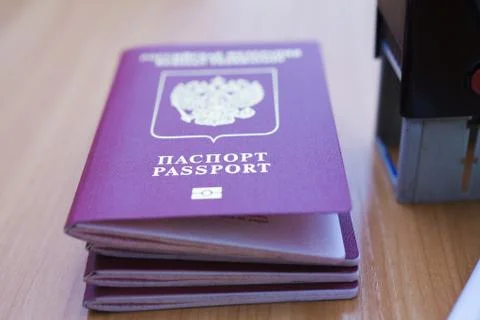 Passport on the table Stock Photos