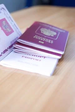 Passport on the table Stock Photos