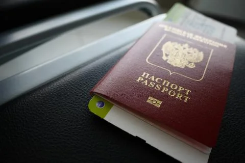 Passport with a ticket inside Stock Photos