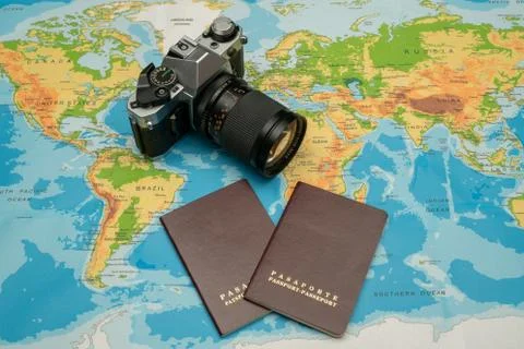 Passport, world map, camera. Travel concept Stock Photos