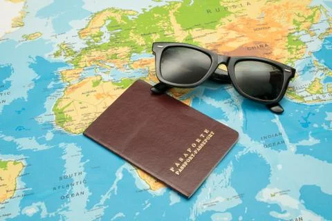 Passport, world map, camera. Travel concept Stock Photos
