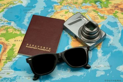 Passport, world map, glasses, camera. Travel concept Stock Photos