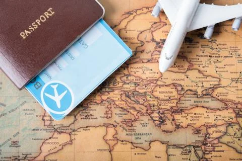 Passports placed on a world map concept Travel Stock Photos