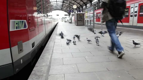 A passsenger on railroad station platform Stock Footage 42808897