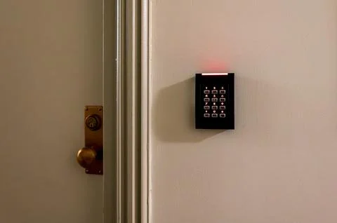 Password code and card swipe security keypad system to unlock the door. Stock Photos