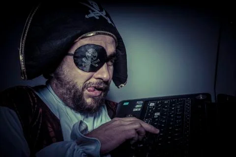 Password, computer security, hacker pirate dress with hat and skull Stock Photos
