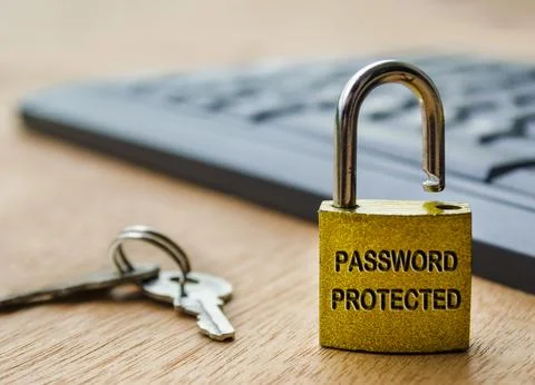 Password protected text engraved on padlock with keyboard background. Passw.. Stock Photos
