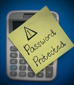 Password protected text written on sticky note on top of a blurred calculator Stock Photos