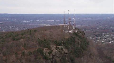 Past telecommunication towers on a rugged hill north of New Haven, Connecticut. Stock Footage 59169297