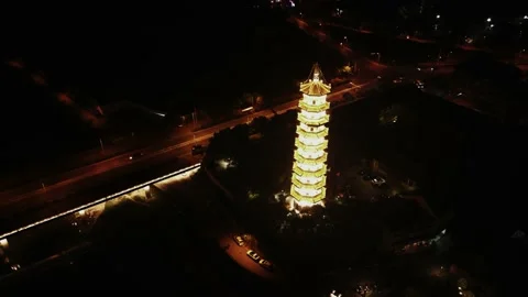 Past The Tower At Night With River Video stock 220839476