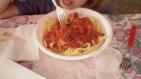 Pasta al sugo kid eat Stock Footage