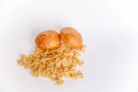 Pasta and bread on a white background. Bread and pasta food group isolated on Stock Photos