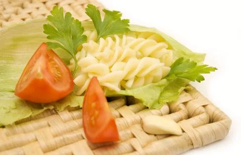 Pasta and tomatoes Stock Photos