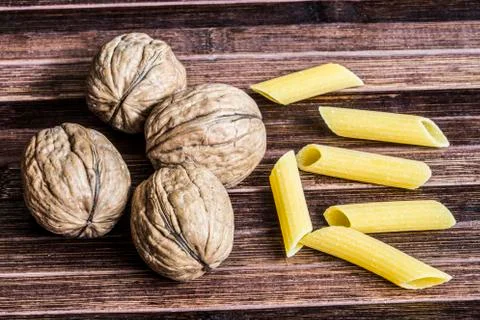 Pasta and walnuts Stock Photos