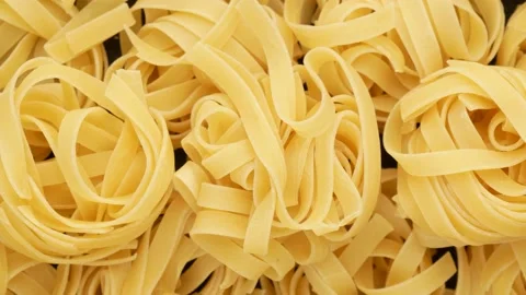 Pasta - background. Raw pasta. Spaghetti. Stock Footage 139758099