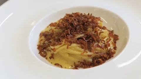 Pasta with bacon in a plate Stock Footage 77480760