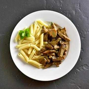 Pasta with beef stroganoff Stock Photos
