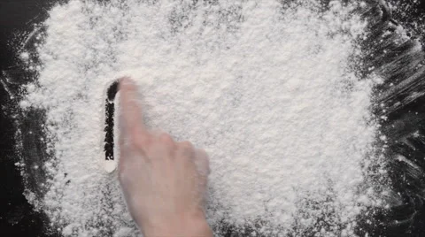 Pasta on black board with flour Stock Footage 60997593
