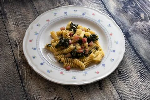 Pasta with black cabbage and bacon Stock Photos