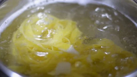 Pasta is boiled in boiling water Stock Footage 123201917