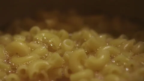 Pasta is boiled in a saucepan Stock Footage 252874790